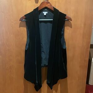 Black velvet vest - dressed up, dress it down. Sleeveless front longer than back